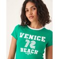 Gina Tricot short sleeve slim fit venice beach print tee in green