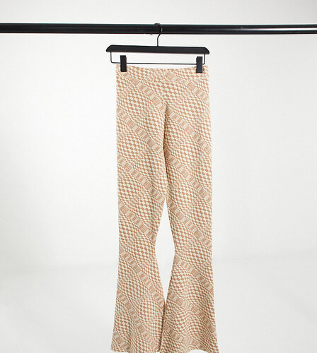 Annorlunda knitted flare trousers in 