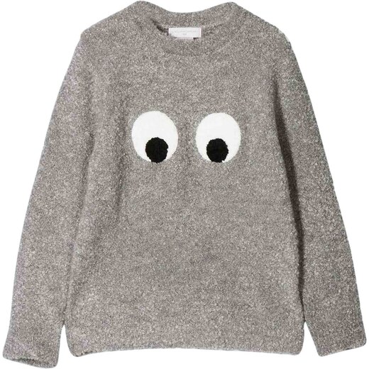 orange cardigan with googly eyes