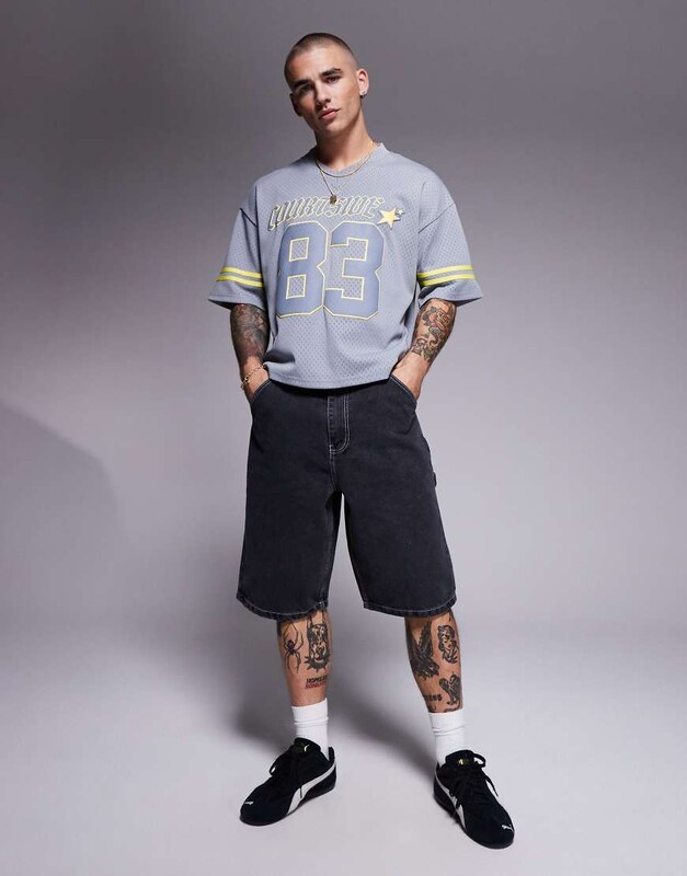 Courtside carpenter denim jort with back pocket embroidery in medium in washed black